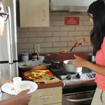 Tambay shows students how to make savory fried plantains.